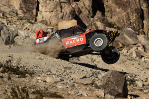 nacho 4x4 ripping off a big rock.