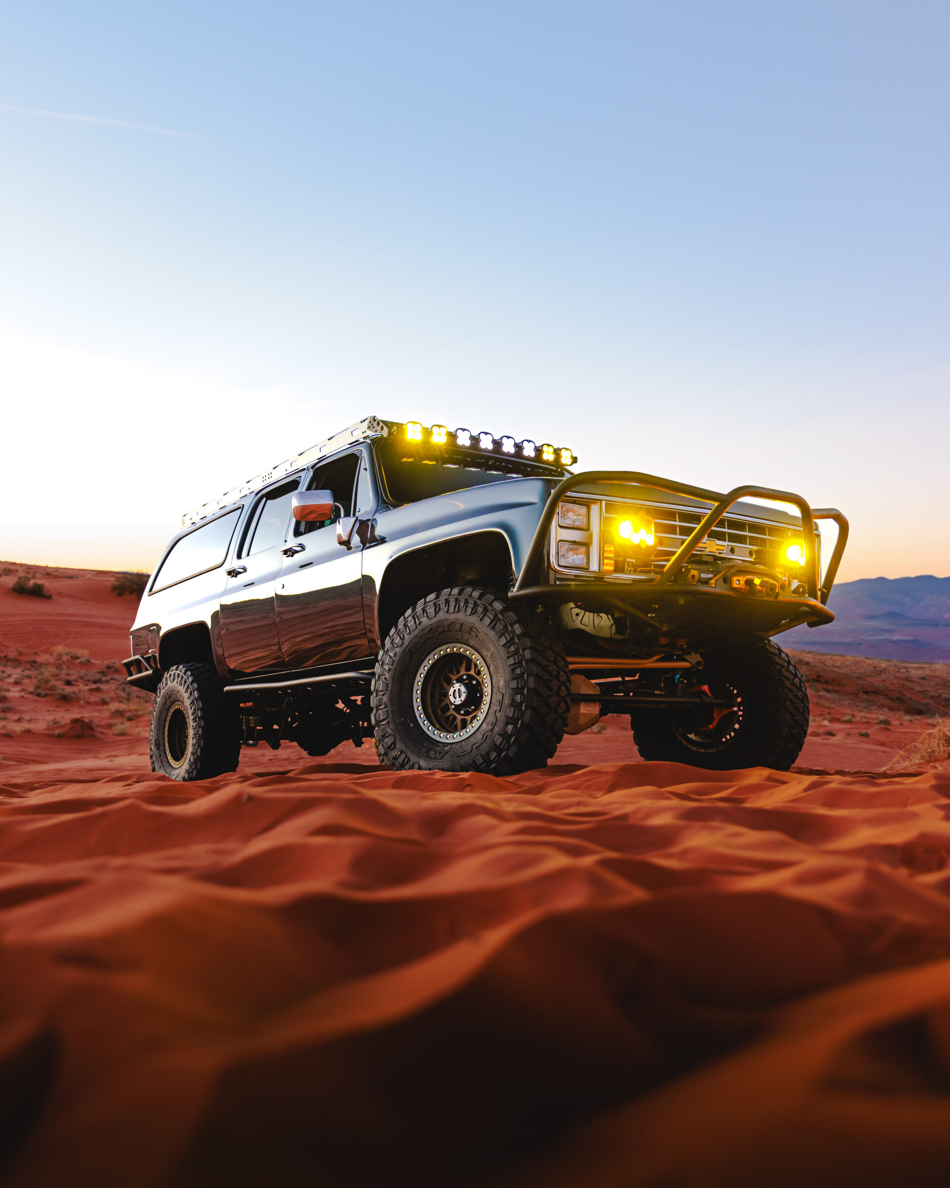 Old School chevrolet on the sand dunes at dusk