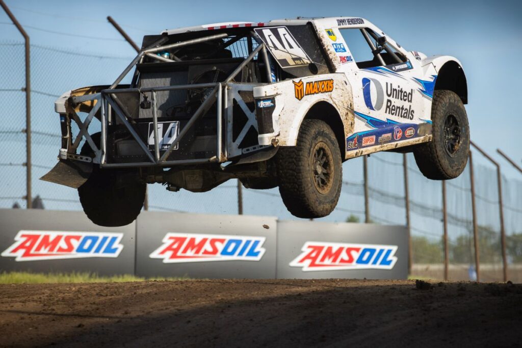 Maxxis athlete on track, mid-air