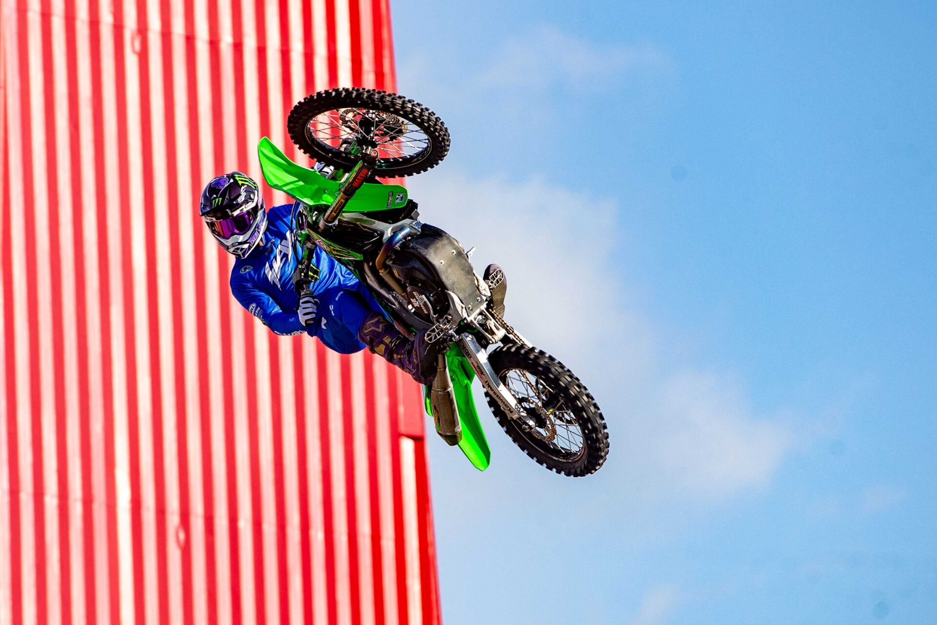 maxxis athlete on a dirt bike in the air