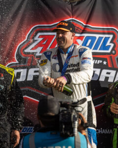 Maxxis athlete henderson on the podium
