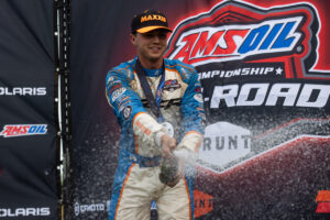 Maxxis athlete on the podium