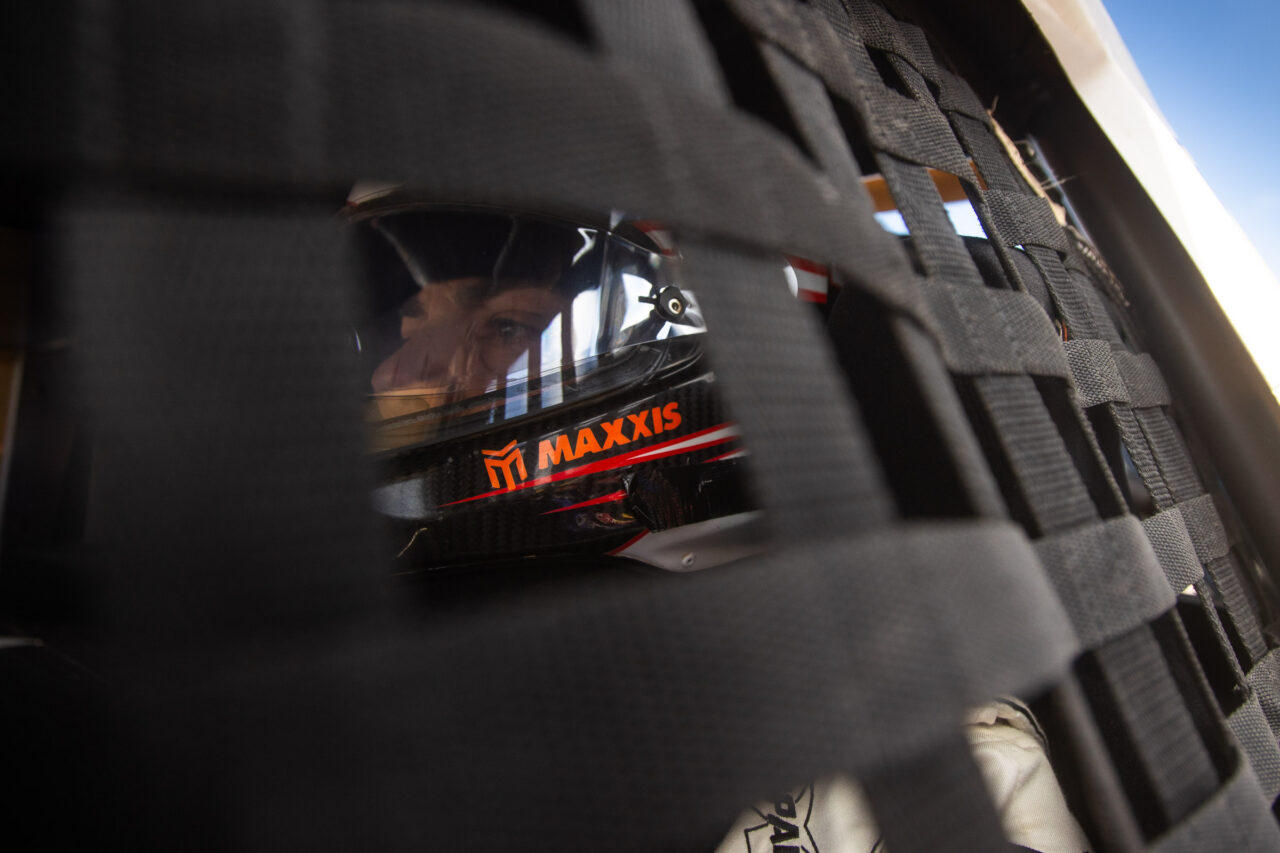 racer strapped in before a race.