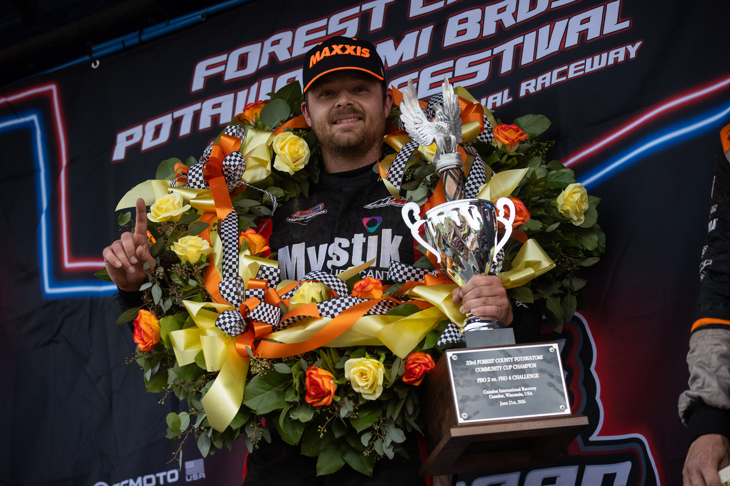 mickey on the podium after a win.