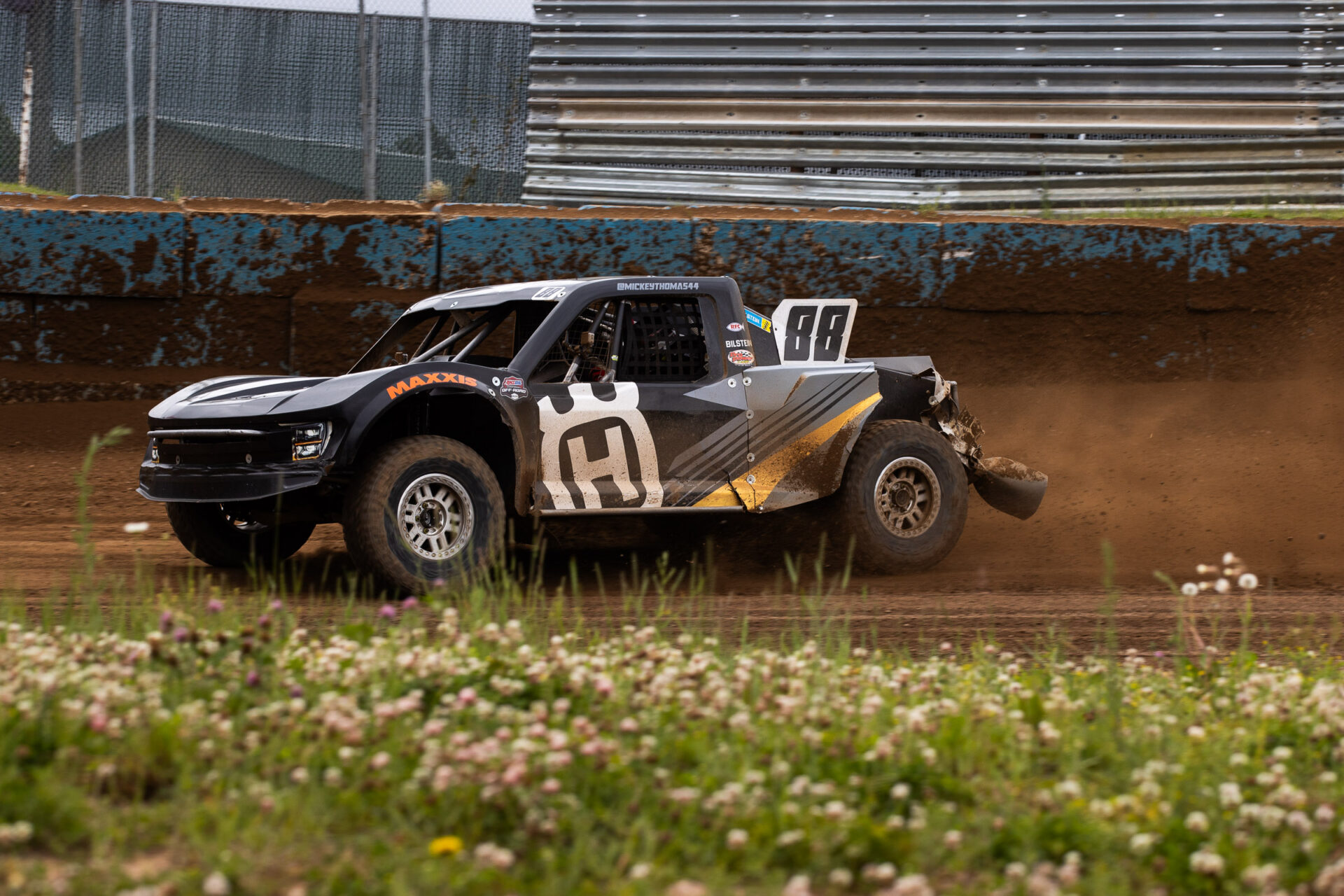 truck 88 sliding sideways through a sweeping left turn.