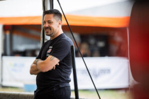 Smiling Jimmy Henderson At the pits