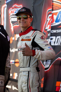 Cash lecroy on podium