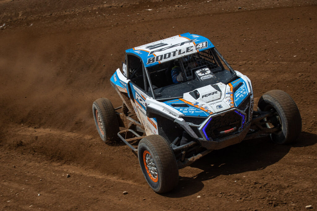 Maxxis athlete bootle on track