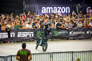 Pat evans on his Stark gesturing to the crowd to amp them up during the Best Trick Competition.