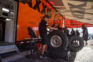 Tire groovers prepping tires.
